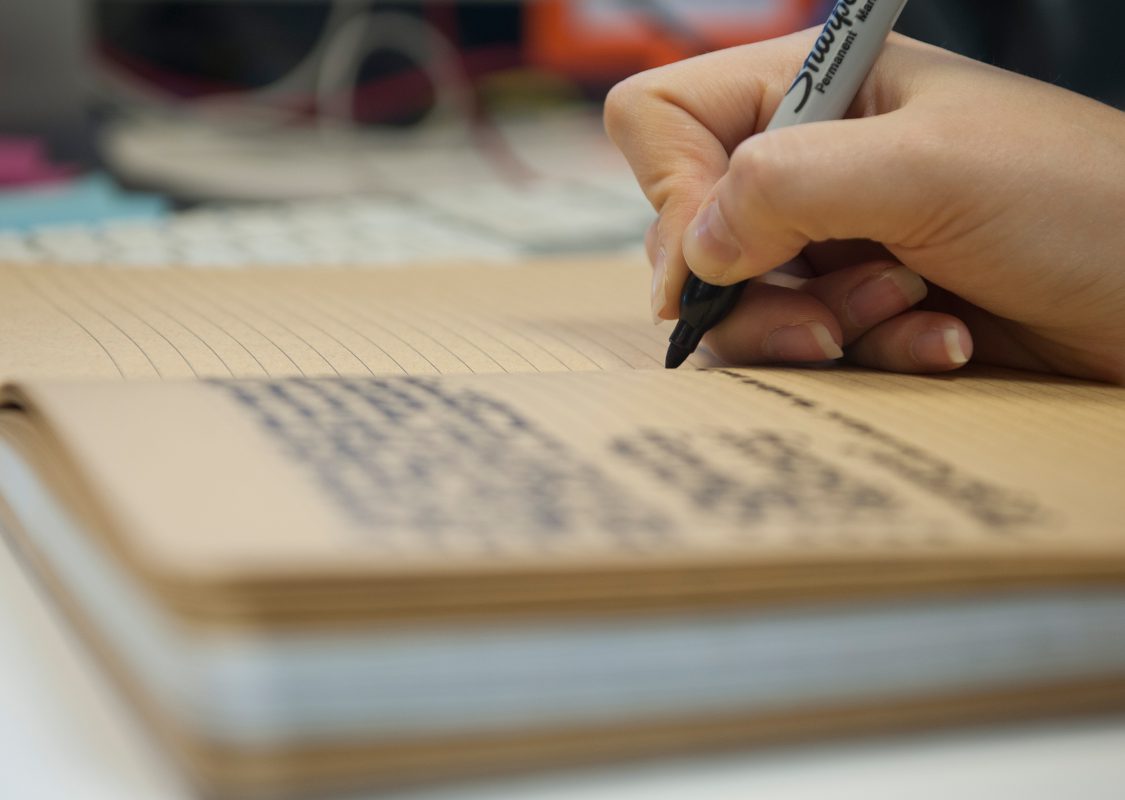 closeup-notebooks-and-pencils